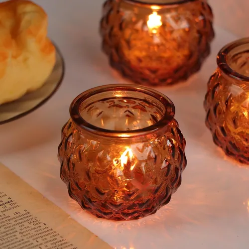 Vista 3 de DARJEN Juego de 24 portavelas votivas ámbar – Portavelas redondos de cristal para centro de mesa, velas de té para el hogar y decoraciones de boda