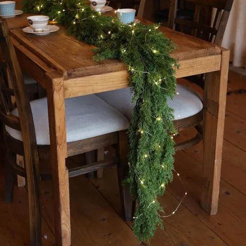 Vista 4 de Guirnalda de Navidad artificial de PARTY JOY de 6 pies con cadena de luces LED, guirnalda de ciprés de aguja de pino para decoración de vacaciones