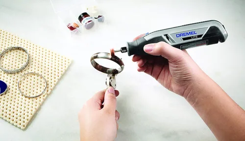 Vista 7 de Dremel 709-02 Kit de accesorios de herramientas rotativas multiusos de 110 piezas, incluye una broca de tallado, tambores de lijado, piedras