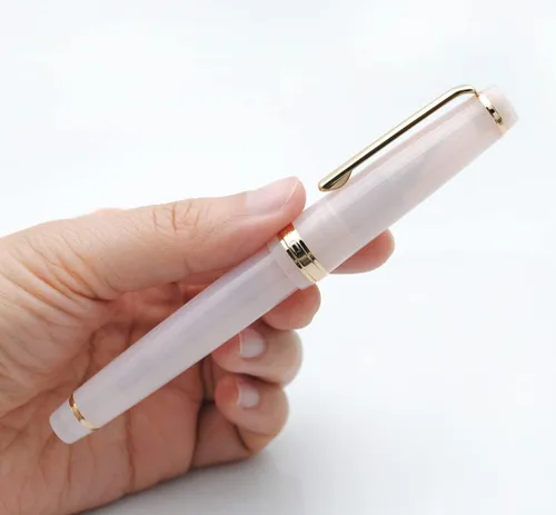 Vista 7 de Pluma estilográfica JINHAO 82 con clip dorado (punta F de 0.5mm, transparente color rosa gato)