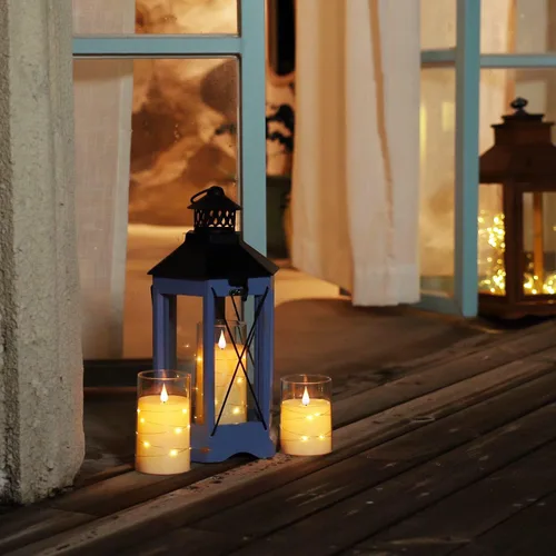 Vista 4 de Homemory Velas parpadeantes sin llama con tira de luces, velas que funcionan con pilas, luces LED de cadena integradas, vela de plexiglás irrompible