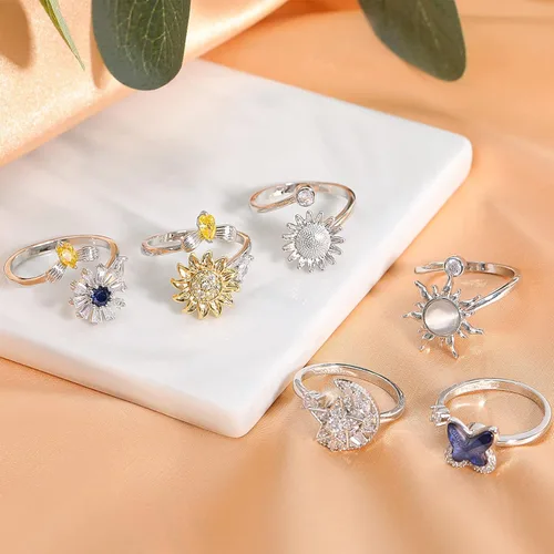 Vista 6 de Honsny Fidget Rings for Women, Spinner Fidget Ring Set, Sunflower Butterfly Bee Star Moon Relief Spinning Rings for Adults