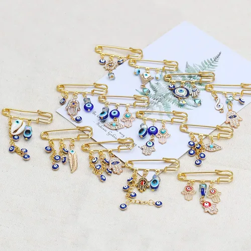 Vista 5 de Turquía Evil Eye Rhinestone Charm Blue Lucky Eyeball Manos Broche Pines Joyería para la Buena Suerte